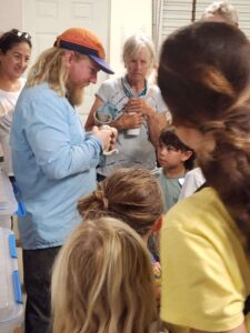 instructor holding snake